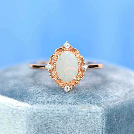 14K Rose Gold 1.5 Carat Oval White Opal Halo Engagement Ring