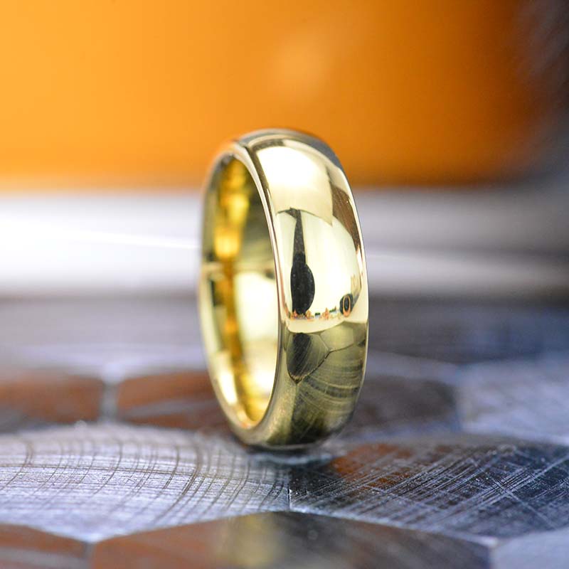 Yellow Gold Tungsten Wedding Band. Yellow Gold Tungsten. Men & Women Tungsten Ring. Tungsten Carbide 6mm Wide. Free Engravings Yellow Gold Tungsten Wedding Band. Yellow Gold Tungsten. Men & Women Tungsten Ring. Tungsten Carbide 6mm Wide. Free Engravings