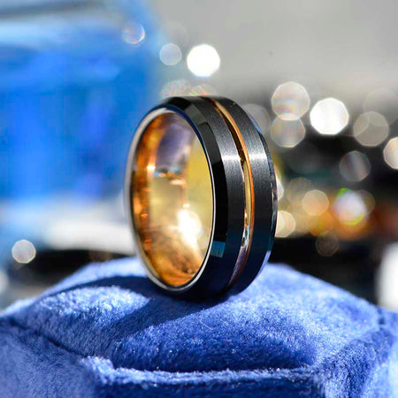 Brushed jet black tungsten band, brilliant 14K gold plating, polished beveled edges, gold center groove, and comfort fit sizing  Comes with Free GIFT!   MADE IN USA.  GILIARTO BRANDED DESIGN- ALL RIGHT RESERVED.  Please note, this is a genuine Abalone Shell ring, and has a higher cost than similar copy rings with paper print on Amazon and eBay.  Usually this ring gets delivered in up to 3 days in USA.