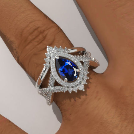 14K White Gold 1 Carat Pear Royal Blue Sapphire Halo Twisted Engagement Ring Eternity Ring Set