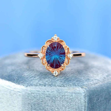 14K Rose Gold 1.5 Carat Oval Fireworks Cut Alexandrite Halo Engagement Ring