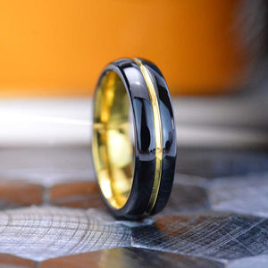 Mirror polished black tungsten band, with yellow gold color plated center strip  polished beveled edges.