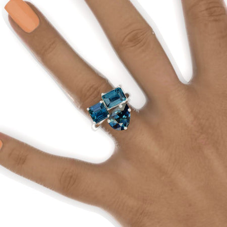 3 Carat Teal Sapphire Cut with Pear Cut Paired with 2 Carat Asscher Cut Teal Sapphire Two-Stone North-South Engagement Ring