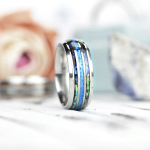 BLUE OPAL:  Center blue opal inlay, makes the ring brilliant and beautiful. ABALONE SHELL:  Abalone