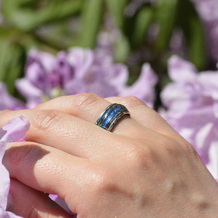 BLUE OPAL:  Center blue opal inlay, makes the ring brilliant and beautiful. ABALONE SHELL:  Abalone